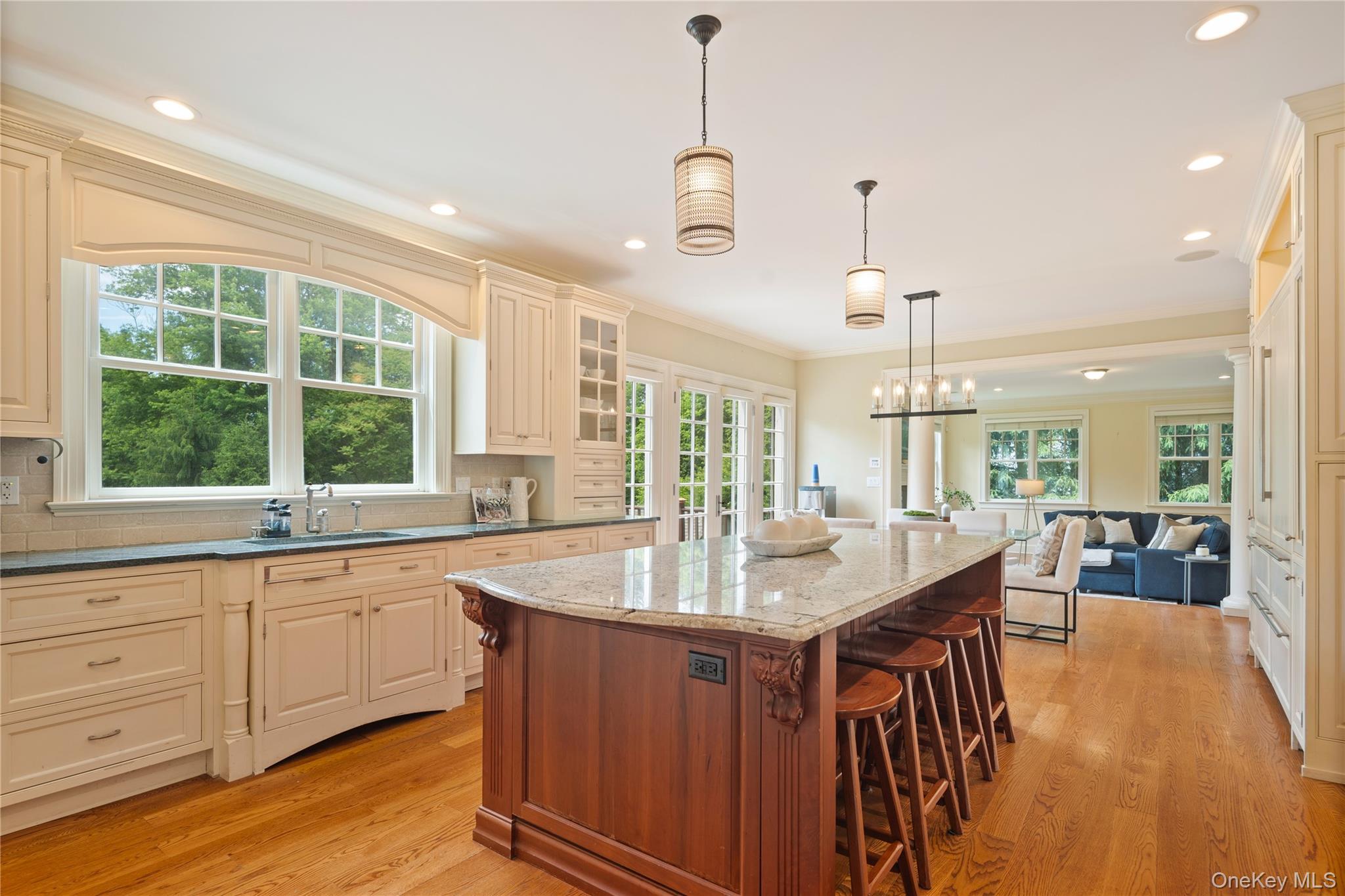 77 Byram Ridge Road Armonk, NY 10504 - Photo 23 of 48 Center island seating, view into family room