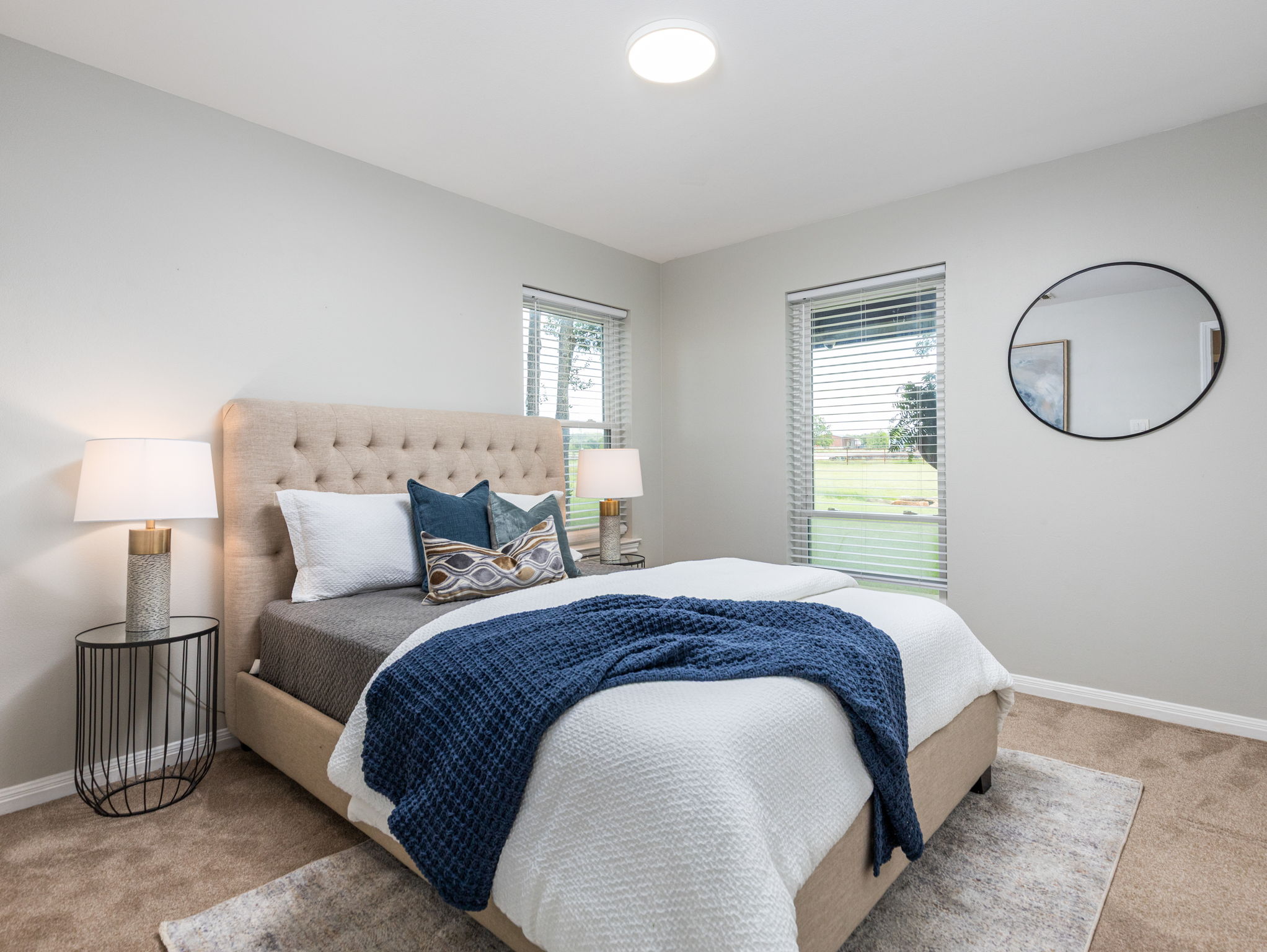 3001 County Road 255 Georgetown, TX 78633 - Photo 20 of 35 Unwind in this serene bedroom #3 sanctuary, complete with plush carpeting and expansive views of the lush landscaped surroundings.