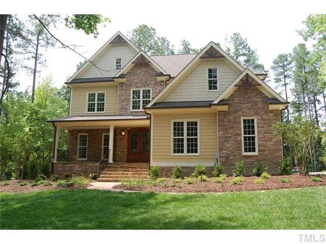 11406 Hickory Grove Church Road Raleigh, NC 27613 - Photo 1 of 12 a front view of a house with a yard