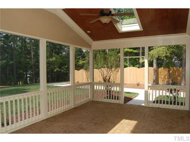 11406 Hickory Grove Church Road Raleigh, NC 27613 - Photo 12 of 12 a balcony with table and chairs