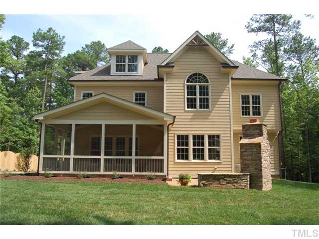 11406 Hickory Grove Church Road Raleigh, NC 27613 - Photo 2 of 12 a front view of a house with a yard