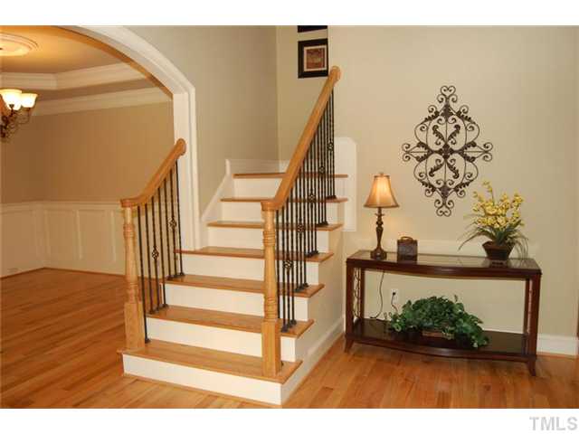 11406 Hickory Grove Church Road Raleigh, NC 27613 - Photo 3 of 12 a view of entryway and hall with wooden floor