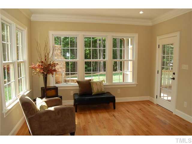 11406 Hickory Grove Church Road Raleigh, NC 27613 - Photo 6 of 12 a living room with furniture and a window