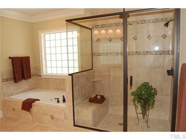11406 Hickory Grove Church Road Raleigh, NC 27613 - Photo 9 of 12 a bathroom with a shower