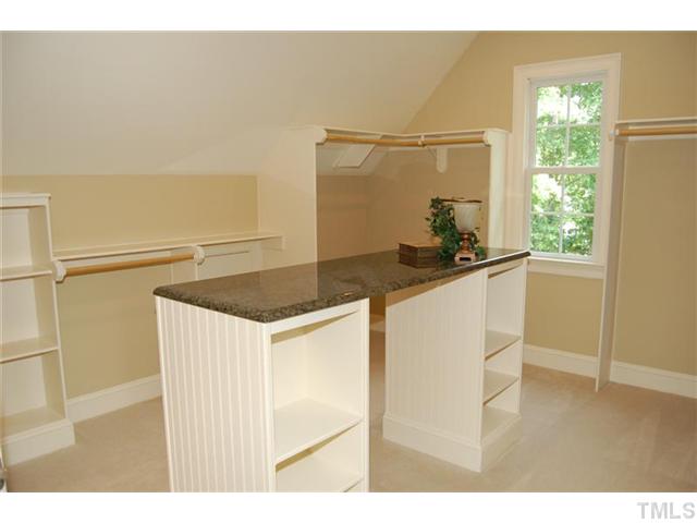 11406 Hickory Grove Church Road Raleigh, NC 27613 - Photo 10 of 12 a kitchen with a sink and a refrigerator