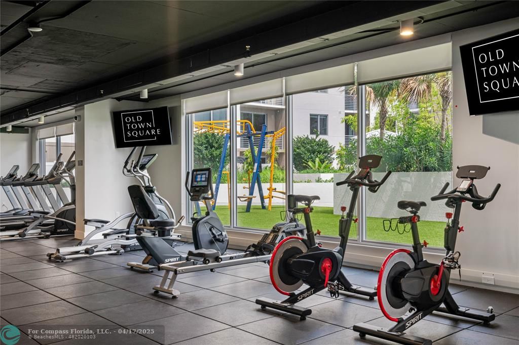 200 Northeast 1st Avenue, Unit 105 Pompano Beach, FL 33060 - Photo 5 of 20 a view of a room with gym equipment