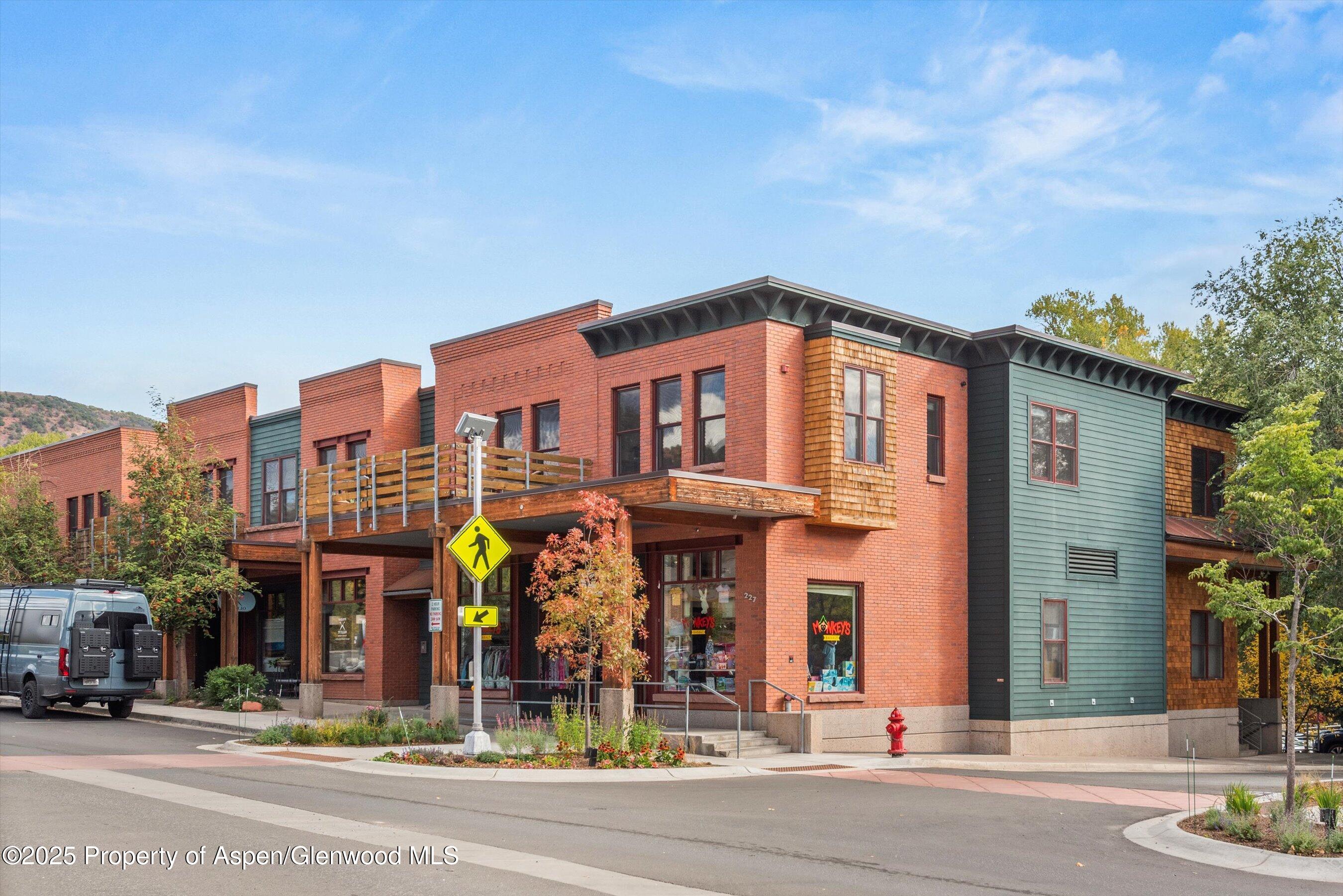 227 Midland Avenue, Unit 22 Basalt, CO 81621 - Photo 2 of 42 a front view of a building with street