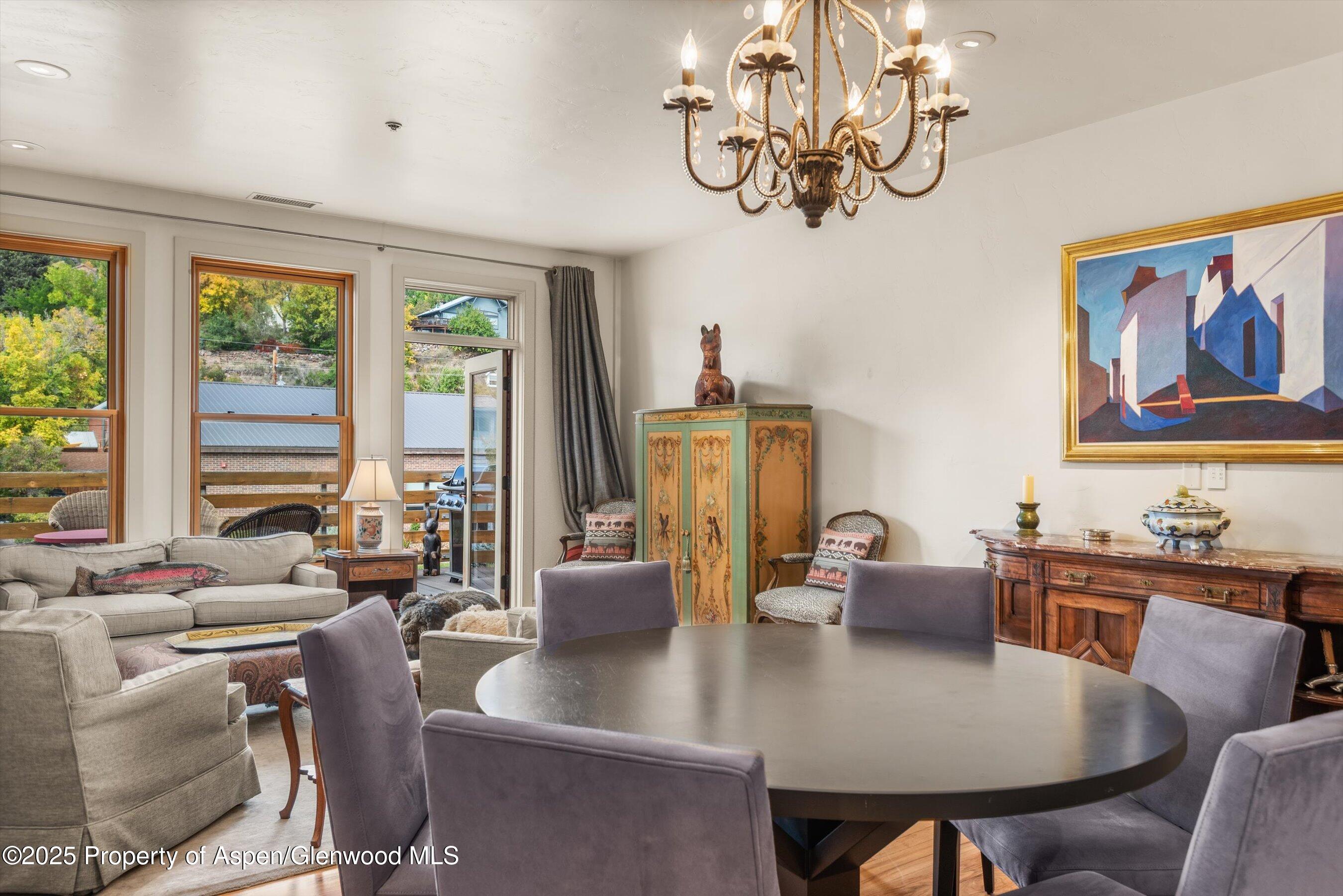 227 Midland Avenue, Unit 22 Basalt, CO 81621 - Photo 23 of 42 a view of a dining room with furniture window and outside view