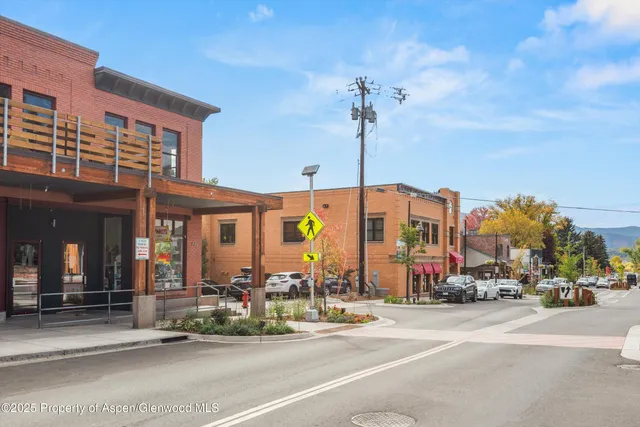 a view of a building with a street