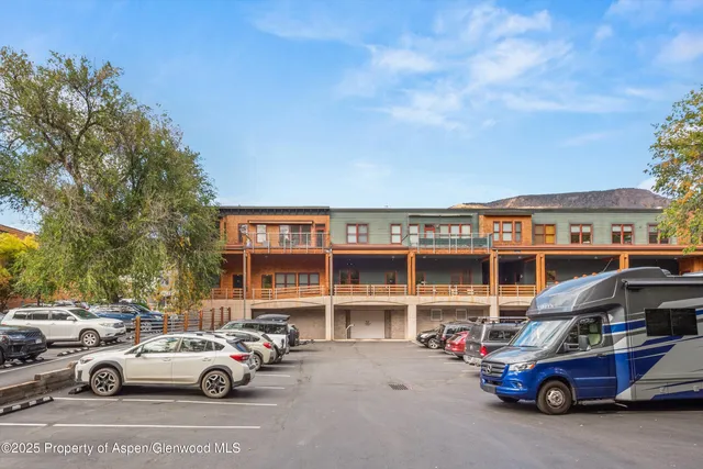 a car parked in front of a building