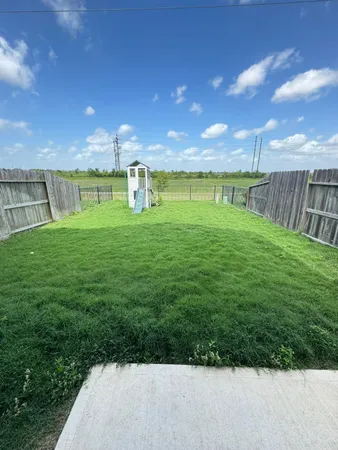 a view of a golf course with a garden