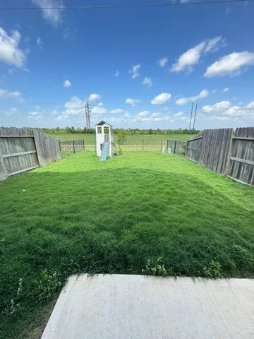 a view of a golf course with a garden