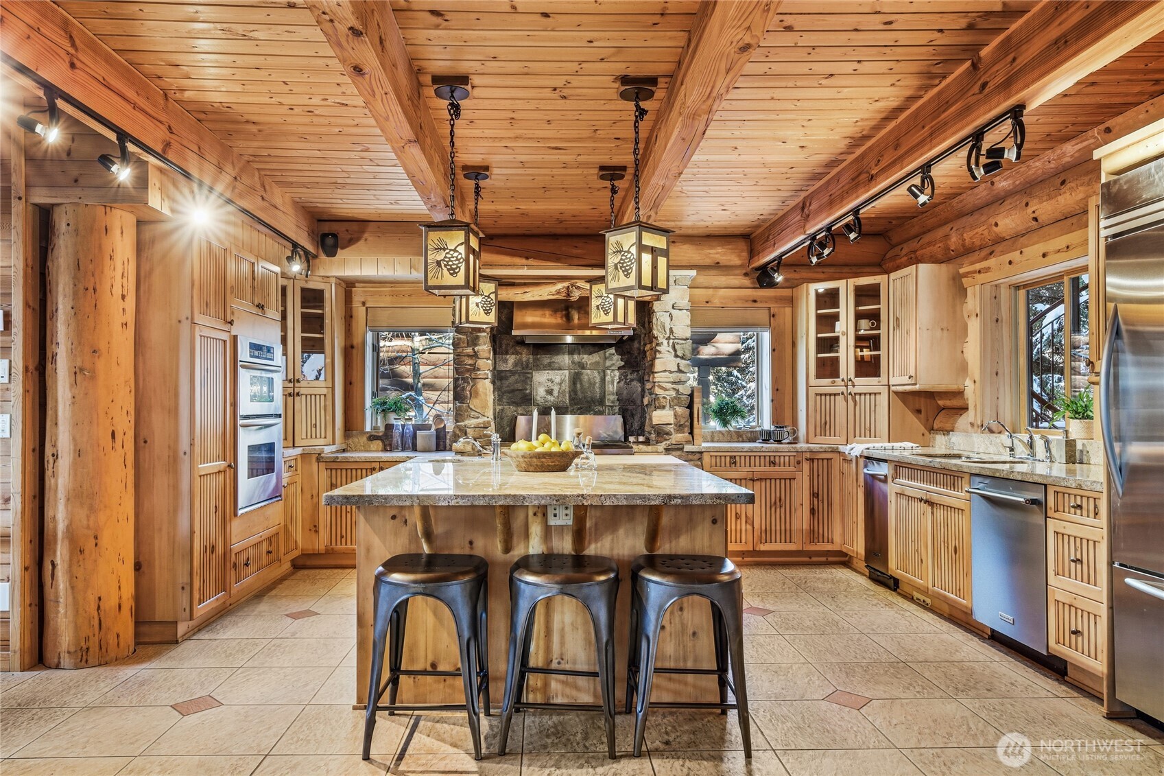 10 Rampart Way Snoqualmie Pass, WA 98068 - Photo 19 of 35 a dining table with chairs and window