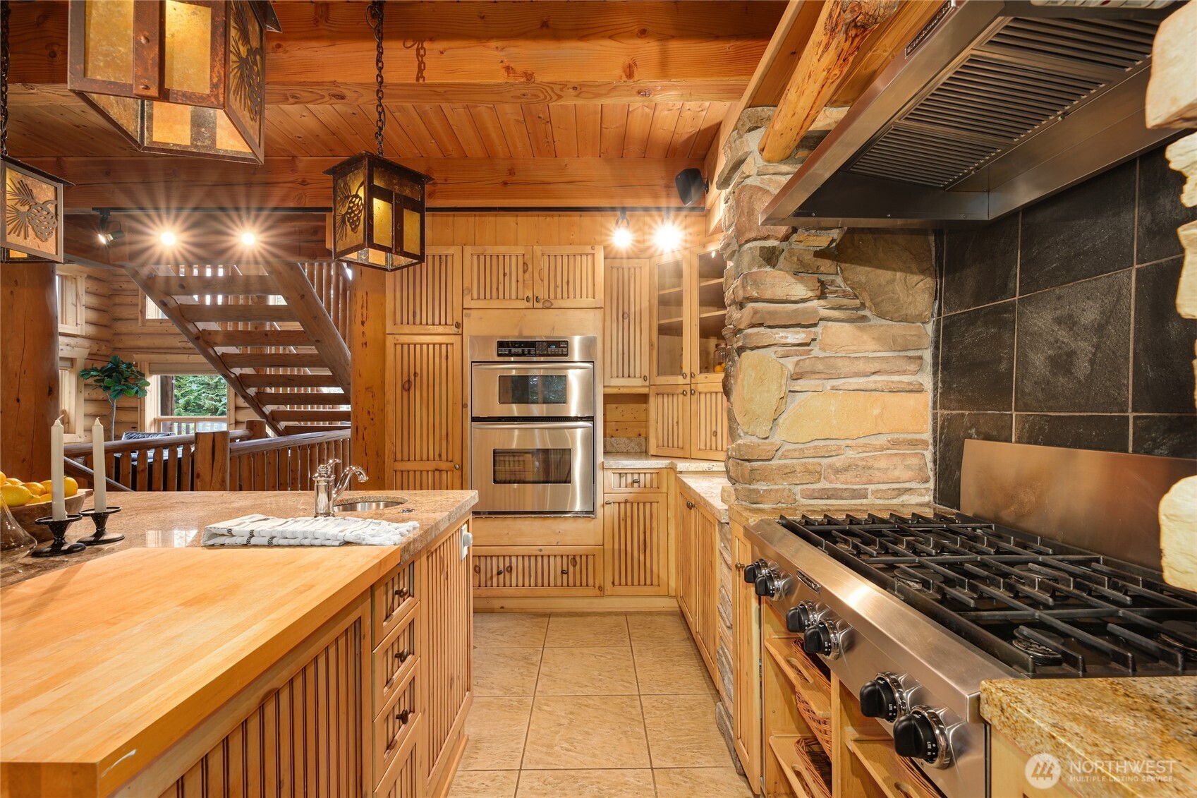 10 Rampart Way Snoqualmie Pass, WA 98068 - Photo 20 of 35 a kitchen with stainless steel appliances a sink and a stove