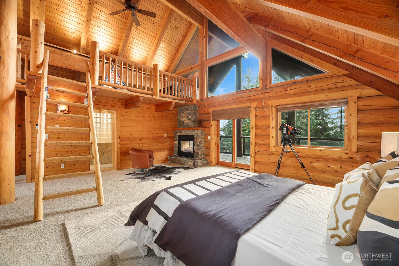 10 Rampart Way Snoqualmie Pass, WA 98068 - Photo 4 of 35 a view of a bedroom with a bed and glass door