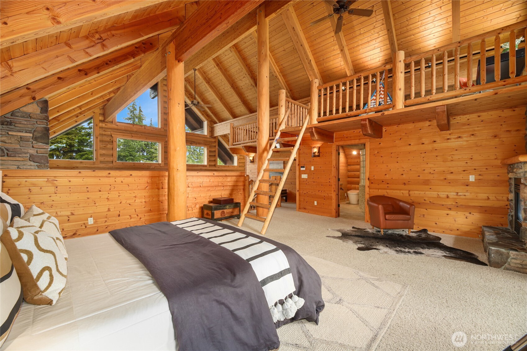 10 Rampart Way Snoqualmie Pass, WA 98068 - Photo 5 of 35 a view of a backyard with a tv