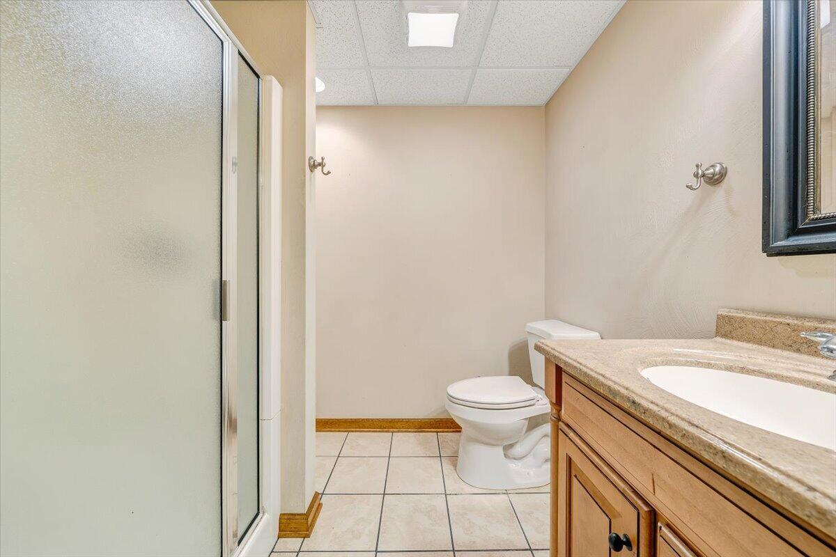 686 Pine Haven Road Fincastle, VA 24090 - Photo 40 of 56 a white toilet sitting next to a bathroom sink