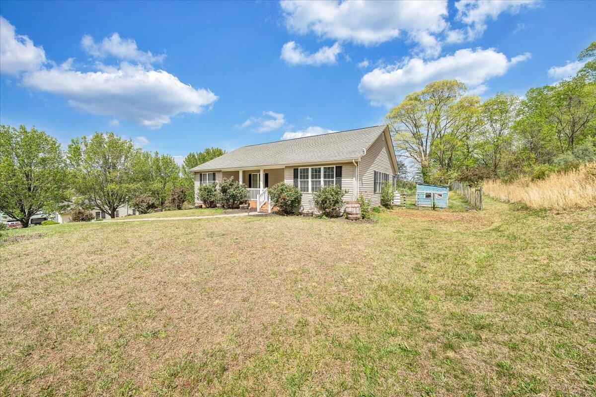 686 Pine Haven Road Fincastle, VA 24090 - Photo 56 of 56 a view of house with yard and mountain view in front of it