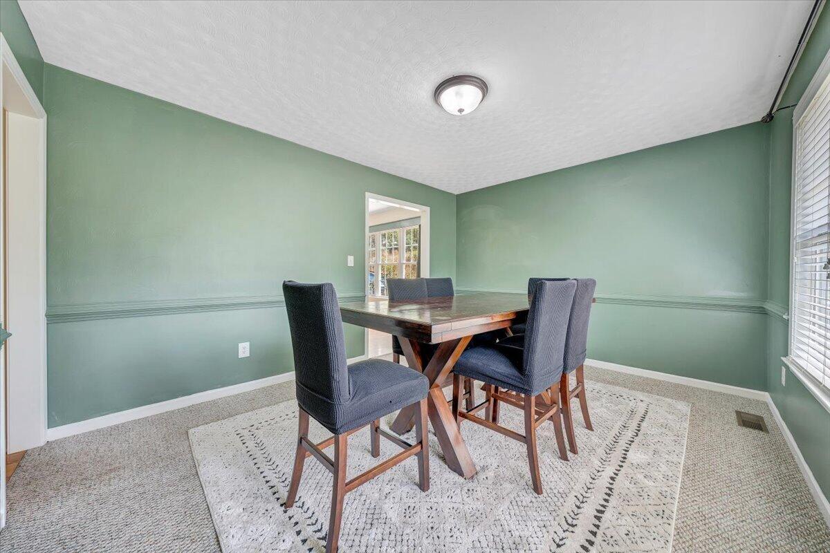 686 Pine Haven Road Fincastle, VA 24090 - Photo 6 of 56 a view of a dining room with furniture