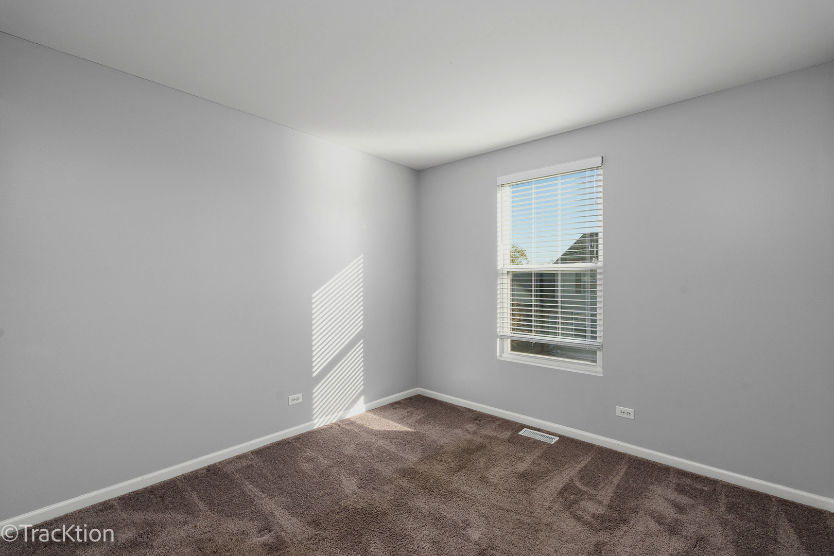 416 Conservatory Lane Aurora, IL 60502 - Photo 11 of 17 a view of an empty room with a window