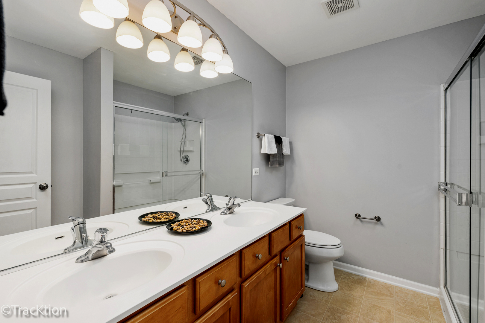 416 Conservatory Lane Aurora, IL 60502 - Photo 10 of 17 a bathroom with a sink vanity granite and toilet