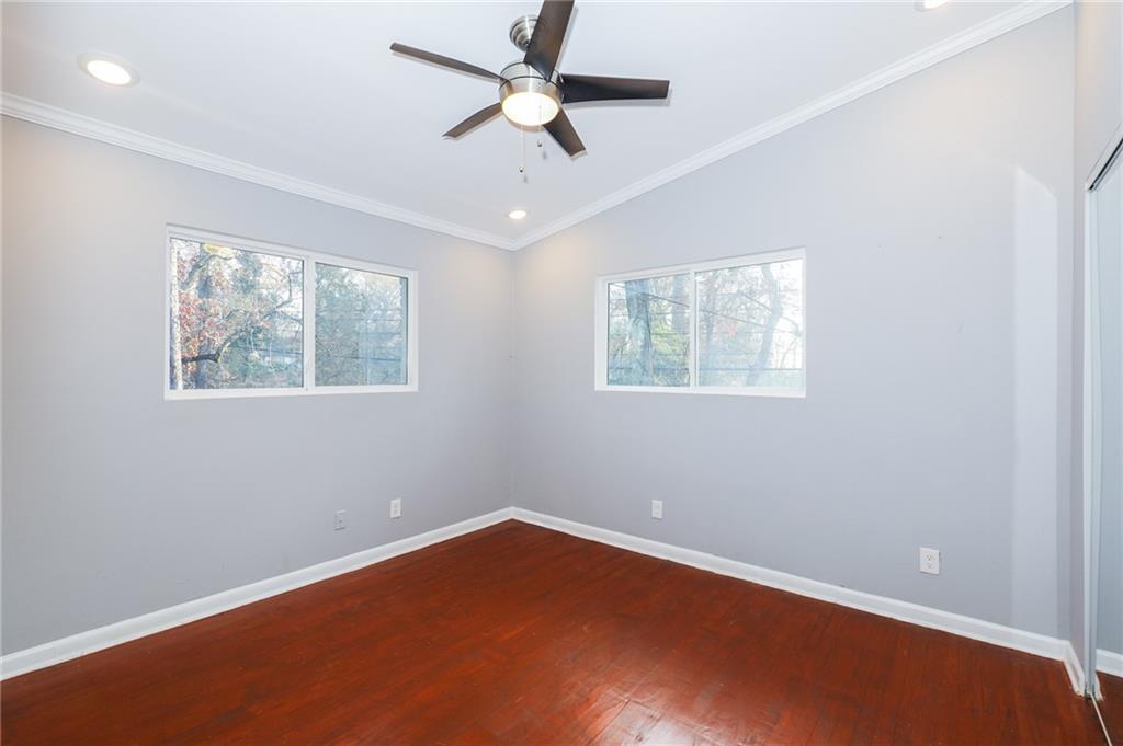 1277 Goodwin Road Northeast, Unit 1273 Atlanta, GA 30324 - Photo 11 of 19 a view of an empty room with a window