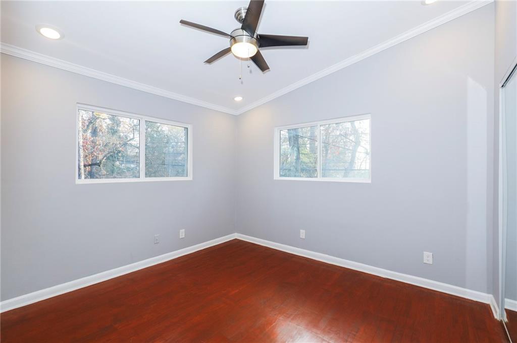1277 Goodwin Road Northeast, Unit 1273 Atlanta, GA 30324 - Photo 13 of 18 a view of an empty room with a window
