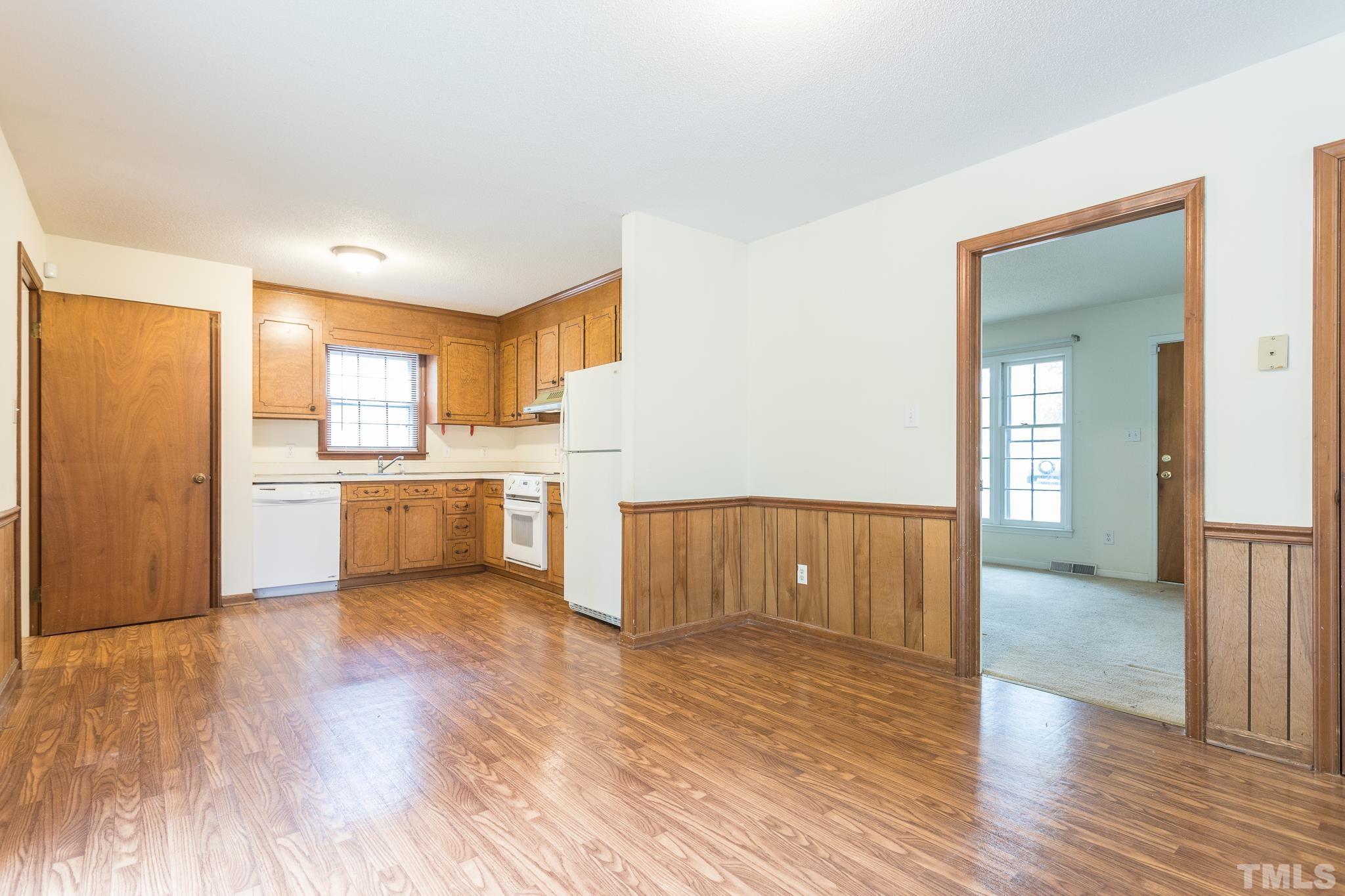 4413 Kilcullen Drive Raleigh, NC 27604 - Photo 13 of 21 a view of kitchen with wooden floor