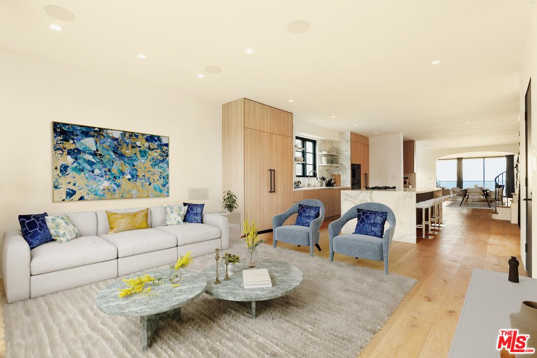 2205 Ocean Front Walk Venice, CA 90291 - Photo 3 of 30 a living room with furniture and wooden floor