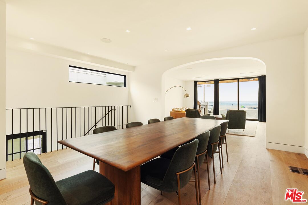2205 Ocean Front Walk Venice, CA 90291 - Photo 8 of 30 a view of a dining room with furniture and wooden floor