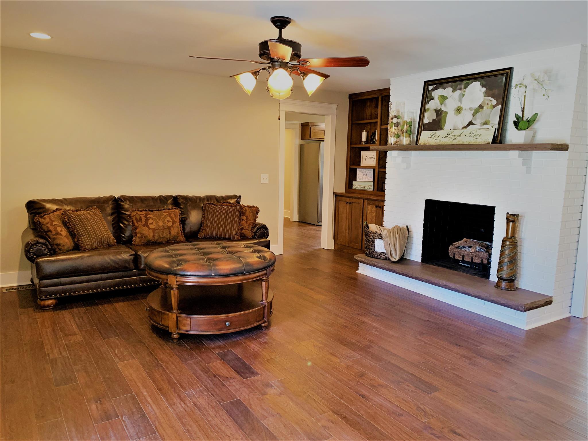 1360 Sixteenth Model Road Manchester, TN 37355 - Photo 9 of 30 a living room with furniture and a fireplace