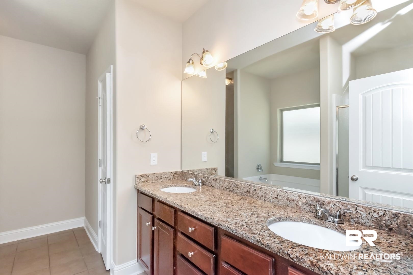 6144 Whitebark Drive Mobile, AL 36693 - Photo 14 of 33 Bathroom with tile patterned flooring, vanity, and a bath