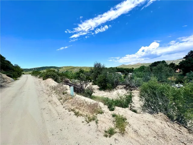 a view of a lake with a mountain in the background