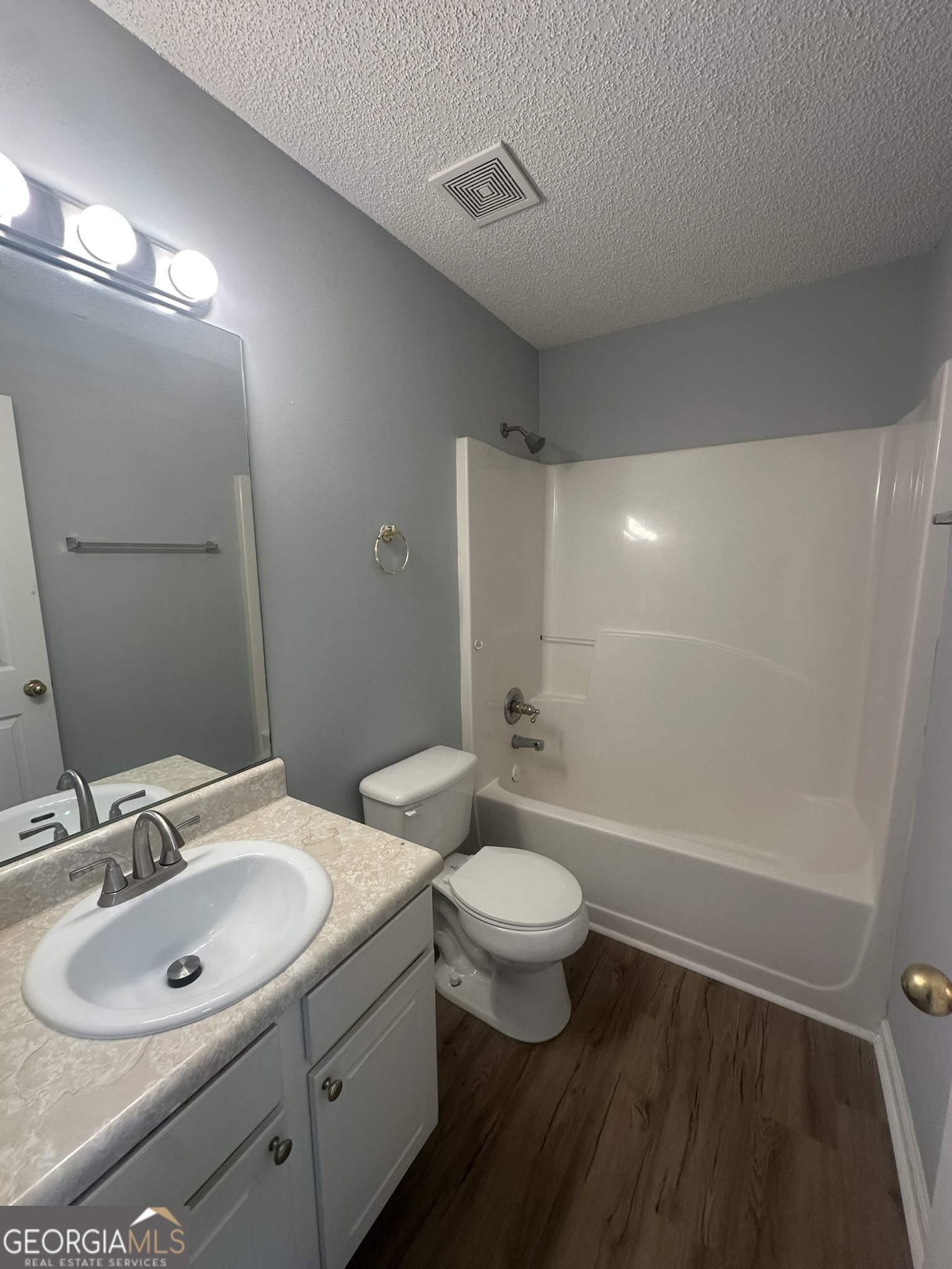 1664 Pinto Trail Jonesboro, GA 30236 - Photo 14 of 31 a bathroom with a double vanity sink toilet and a mirror