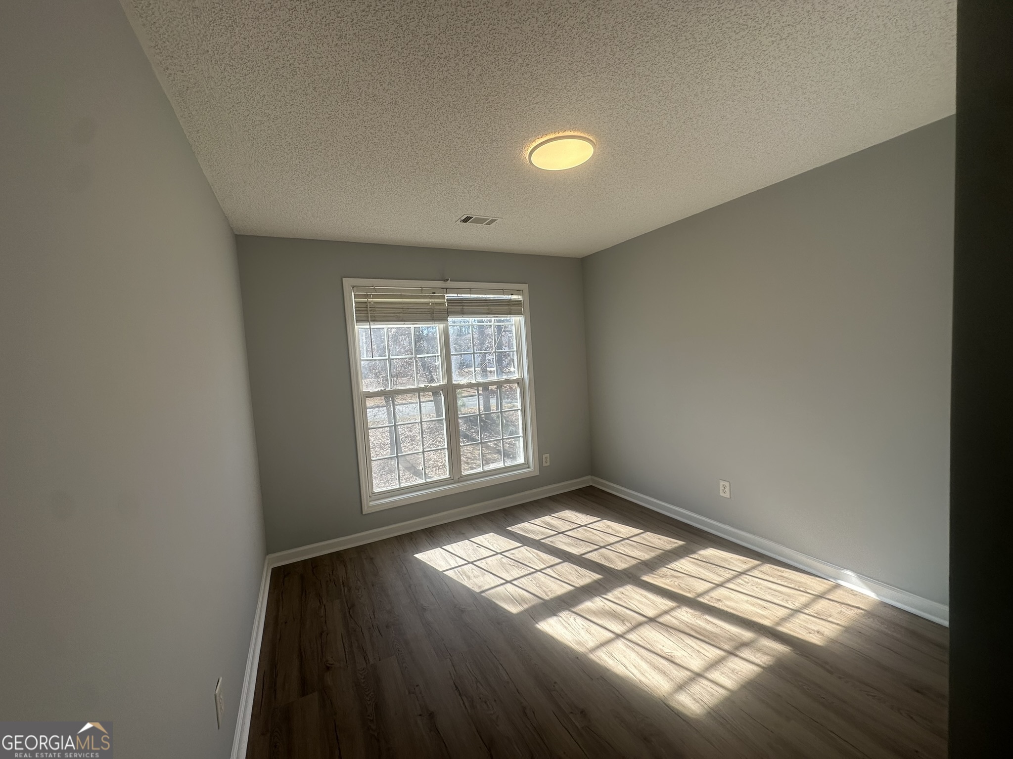 1664 Pinto Trail Jonesboro, GA 30236 - Photo 16 of 31 an empty room with windows