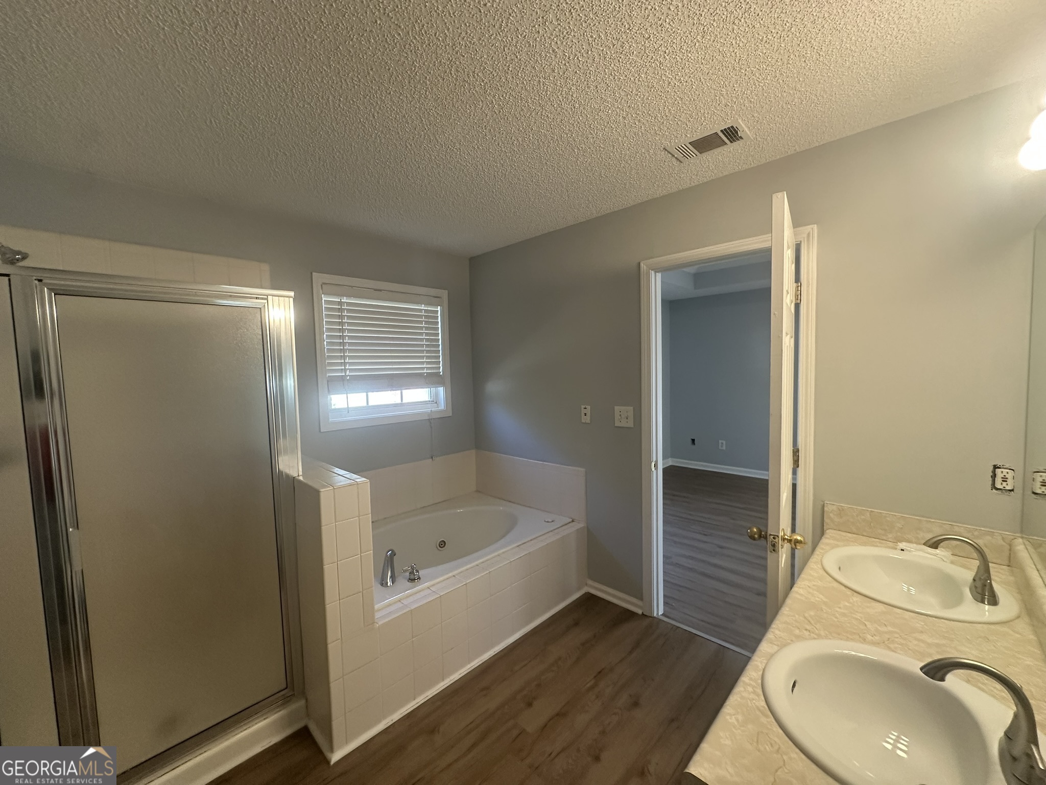 1664 Pinto Trail Jonesboro, GA 30236 - Photo 22 of 31 a bathroom with a sink toilet and shower