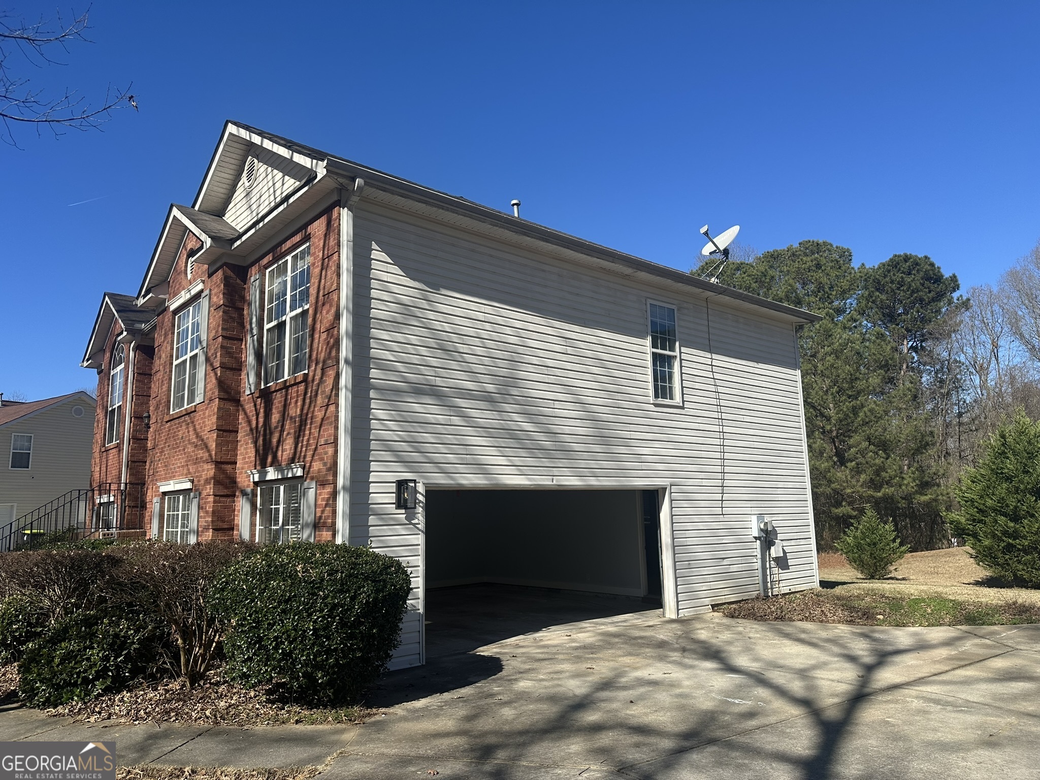 1664 Pinto Trail Jonesboro, GA 30236 - Photo 3 of 31 a front view of a house with a yard
