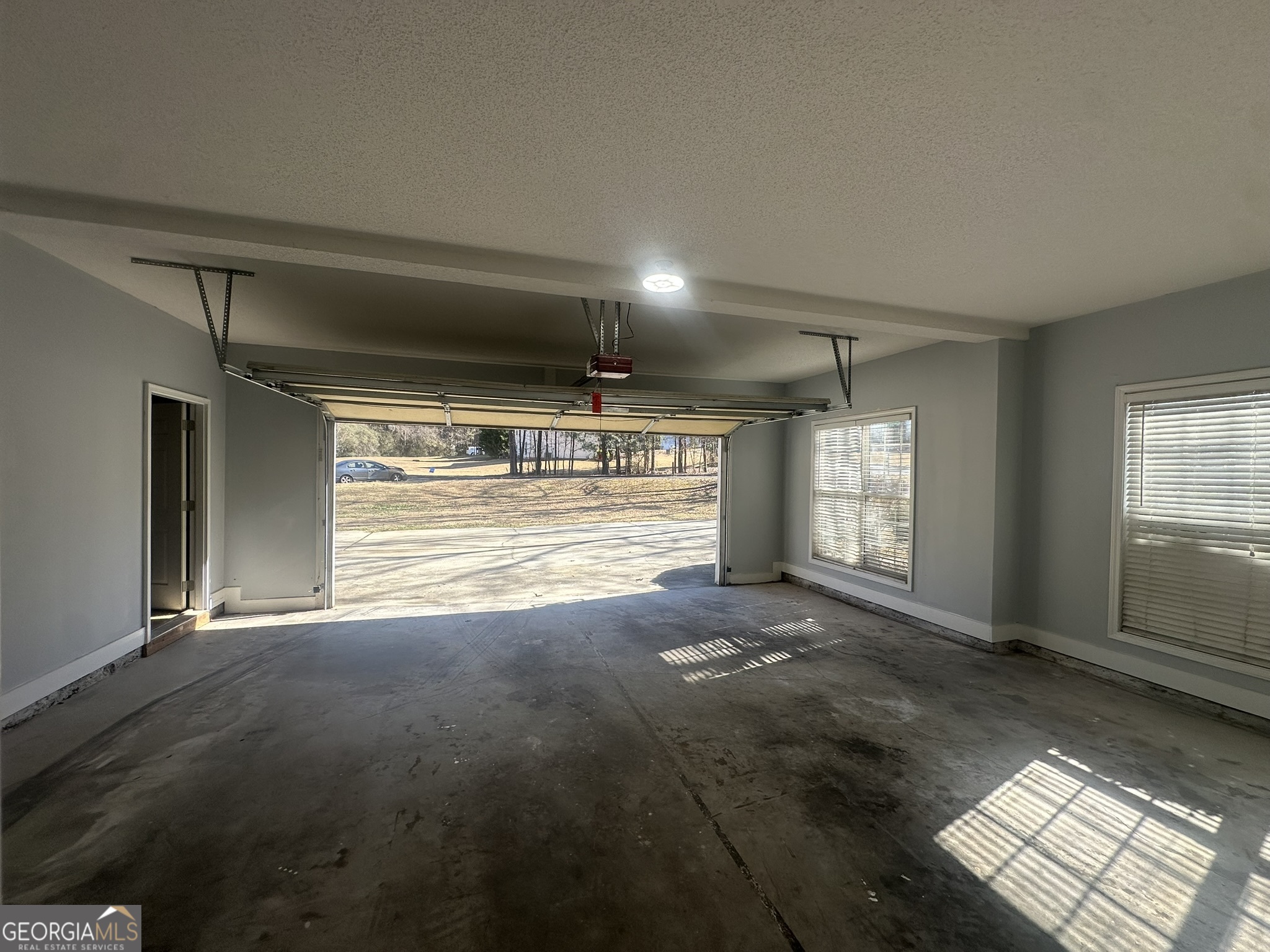 1664 Pinto Trail Jonesboro, GA 30236 - Photo 31 of 31 a view of an empty room with window and wooden floor