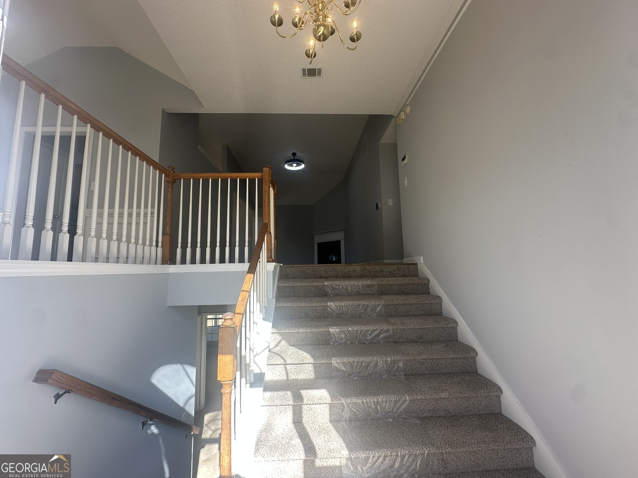 1664 Pinto Trail Jonesboro, GA 30236 - Photo 5 of 31 a view of entryway and hall with wooden floor
