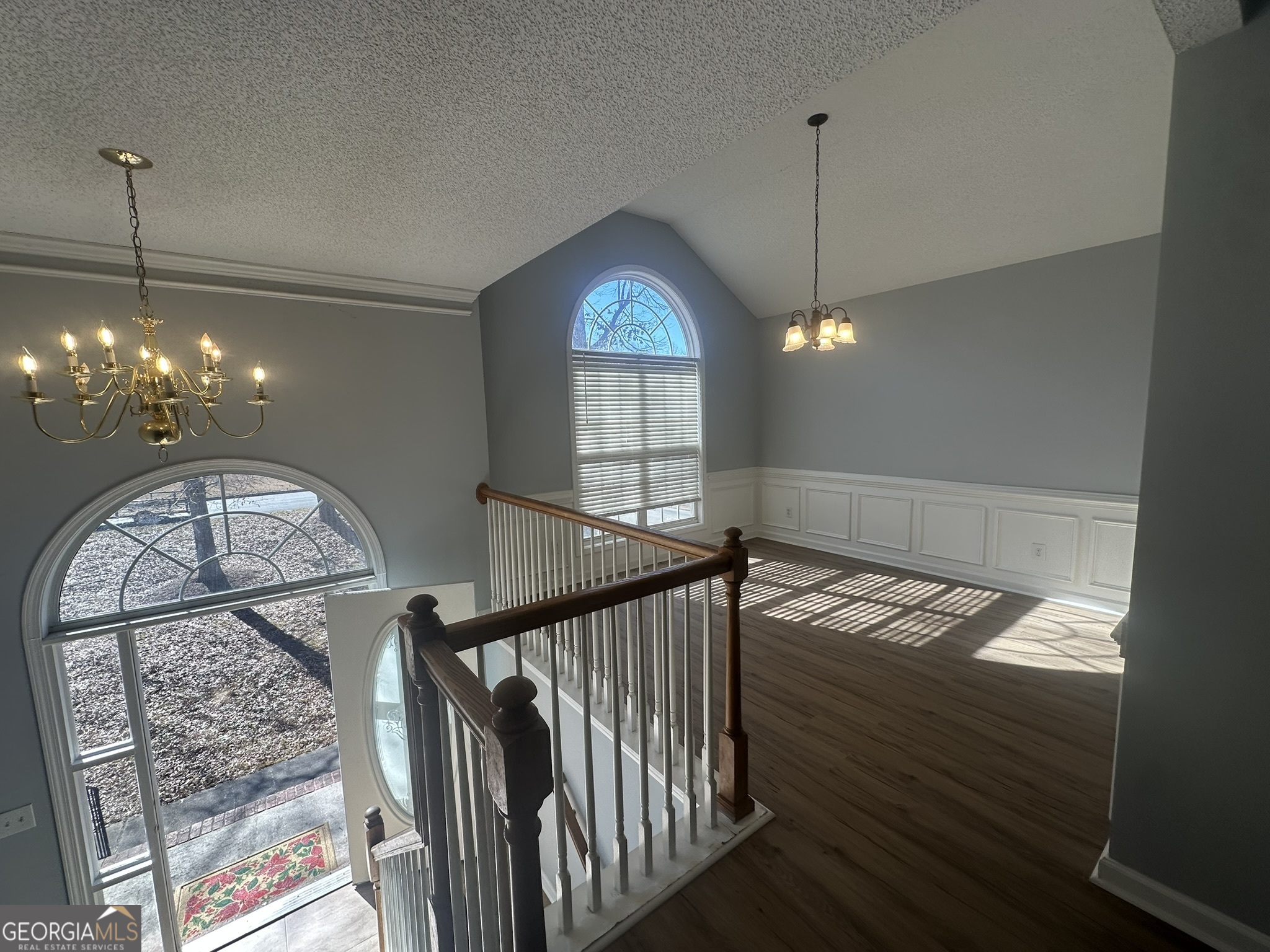 1664 Pinto Trail Jonesboro, GA 30236 - Photo 7 of 31 a view of a livingroom with furniture wooden floor and a chandelier