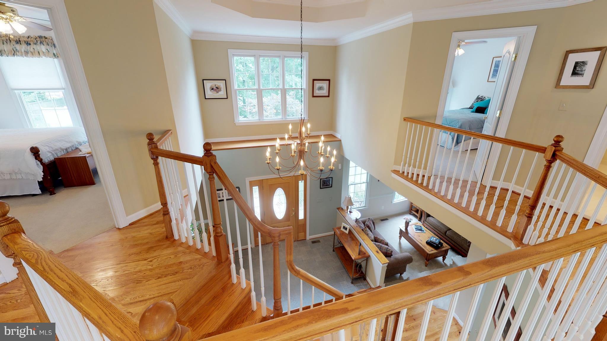 24723 Ridge Road Damascus, MD 20872 - Photo 13 of 29 View from 2 story landing over Foyer