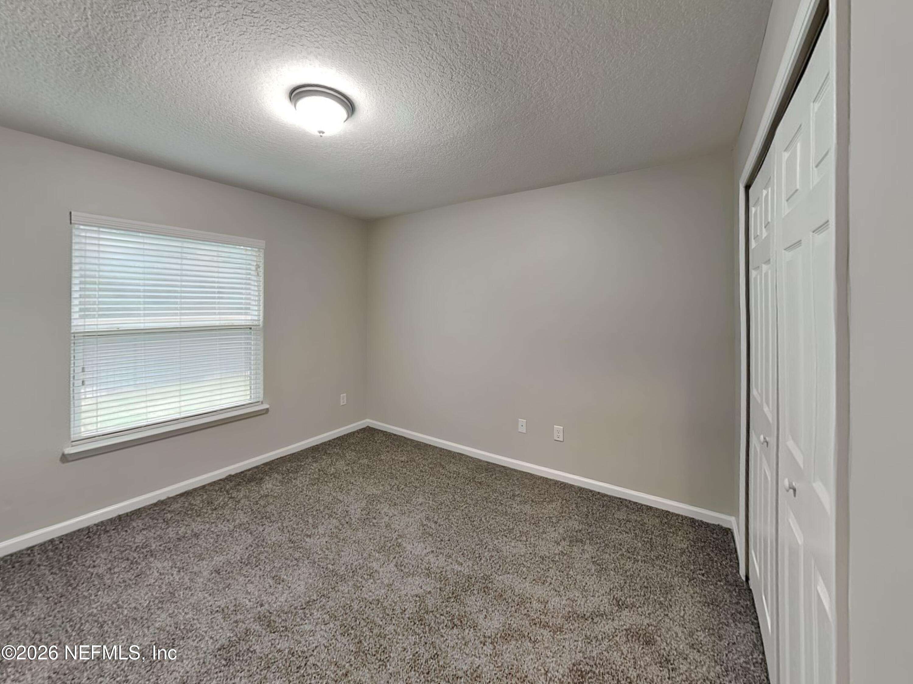 83245 Purple Martin Drive Yulee, FL 32097 - Photo 13 of 23 11_Bedroom-01_Image_89ofrn9upW