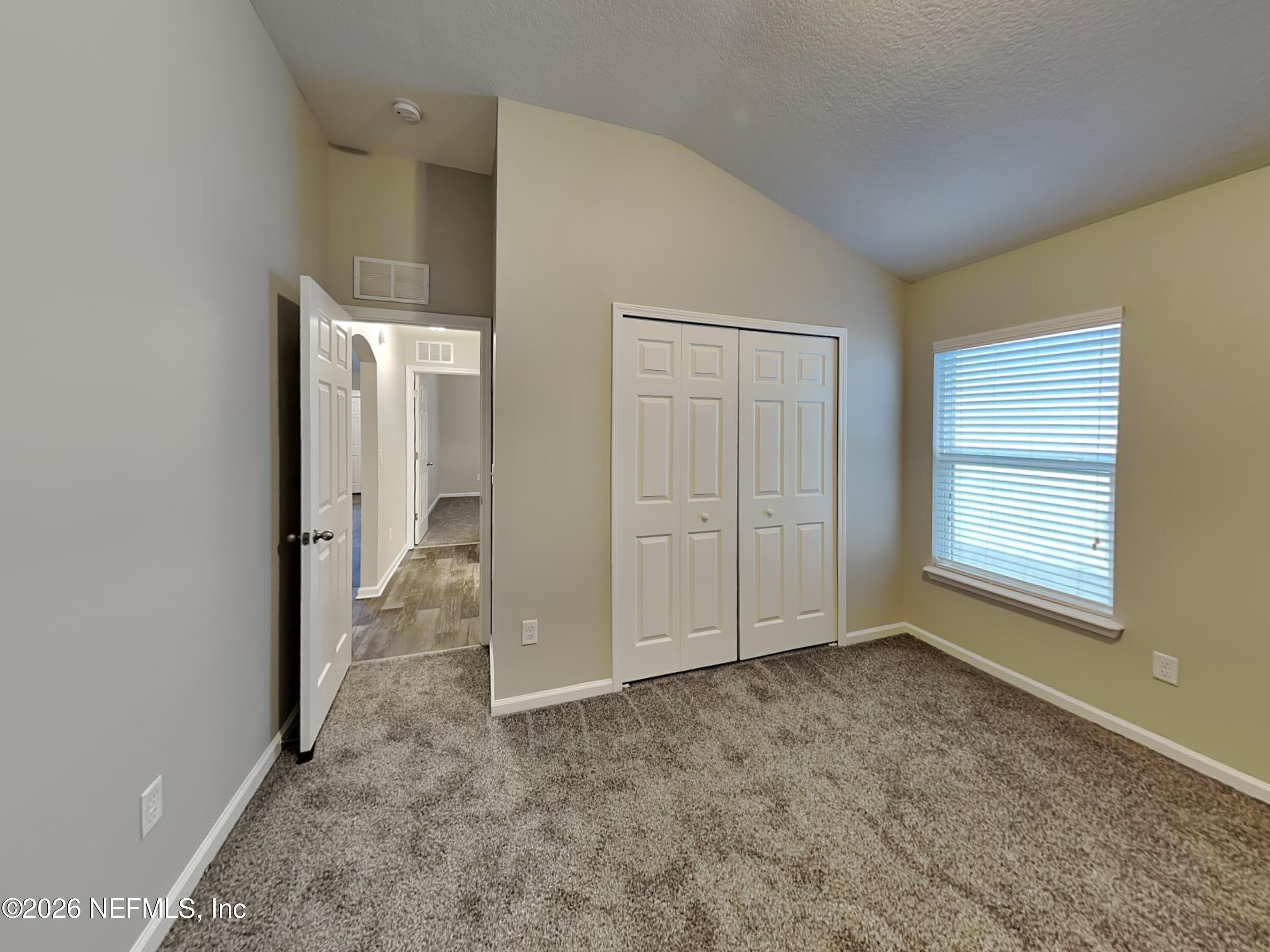 83245 Purple Martin Drive Yulee, FL 32097 - Photo 14 of 23 12_Bedroom-03_Image_YdargBQluA