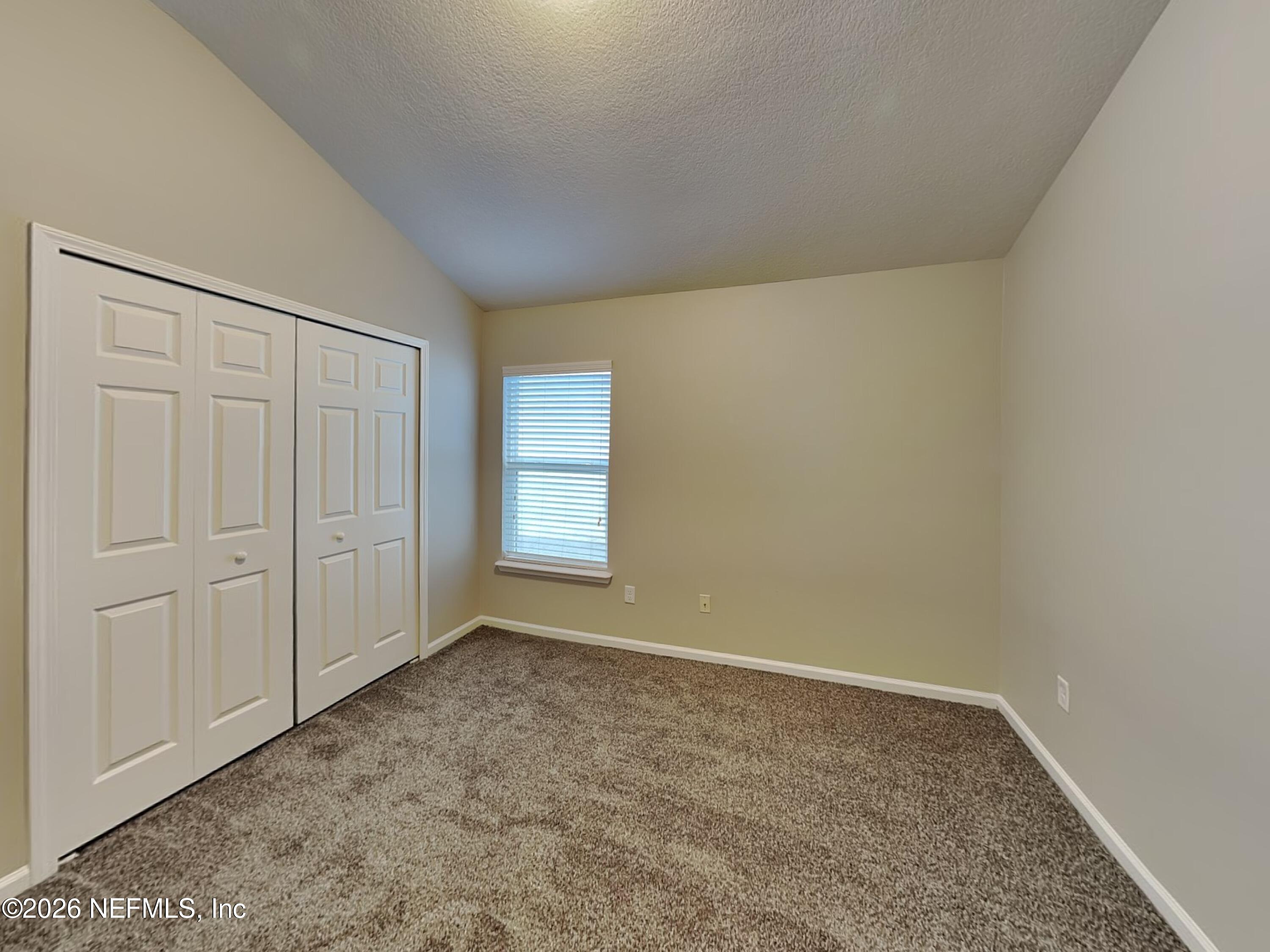83245 Purple Martin Drive Yulee, FL 32097 - Photo 15 of 23 13_Bedroom-03_Image_mkLaPT8Wz1