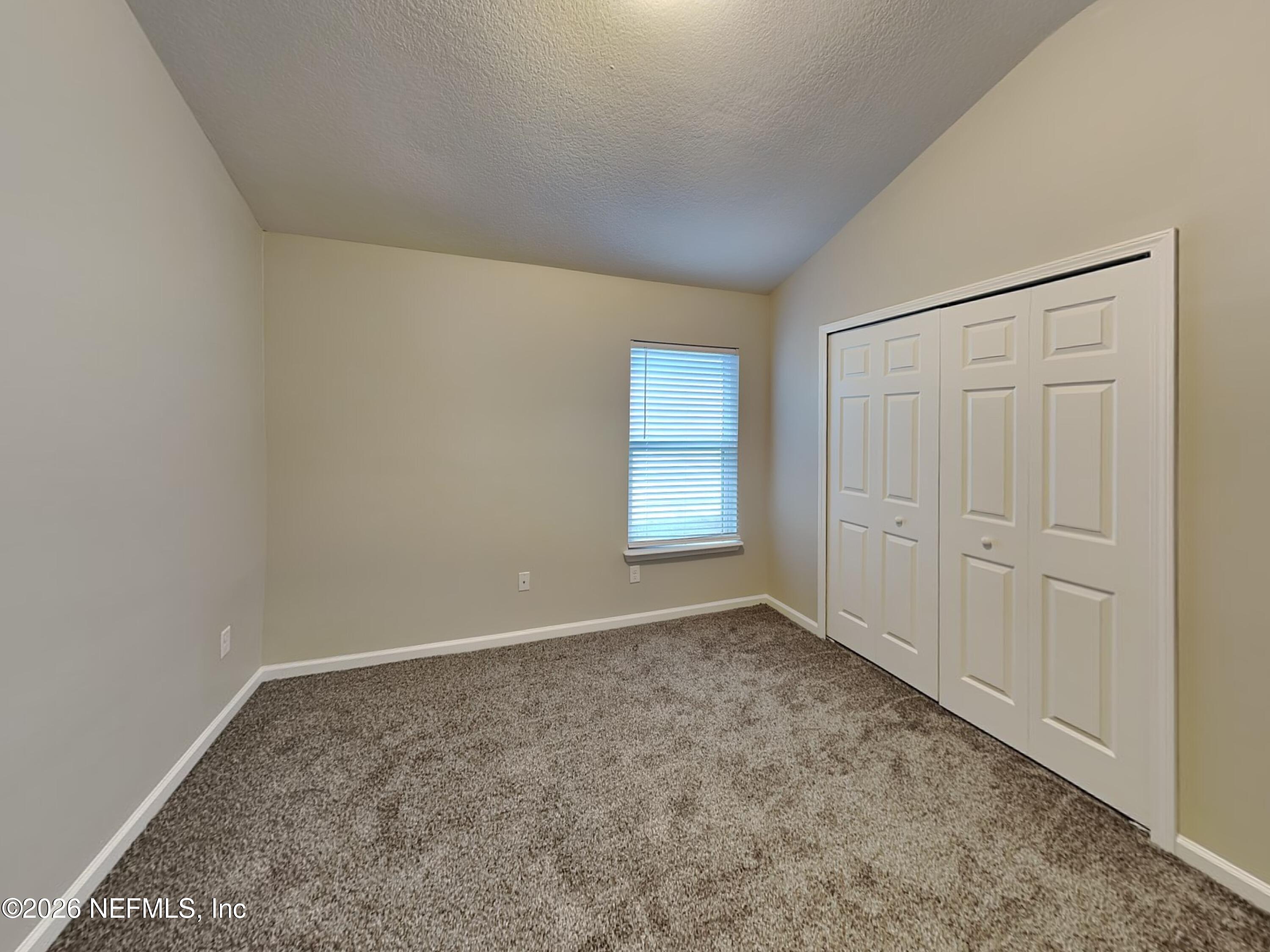 83245 Purple Martin Drive Yulee, FL 32097 - Photo 16 of 23 14_Bedroom-04_Image_rmviAt63Yo