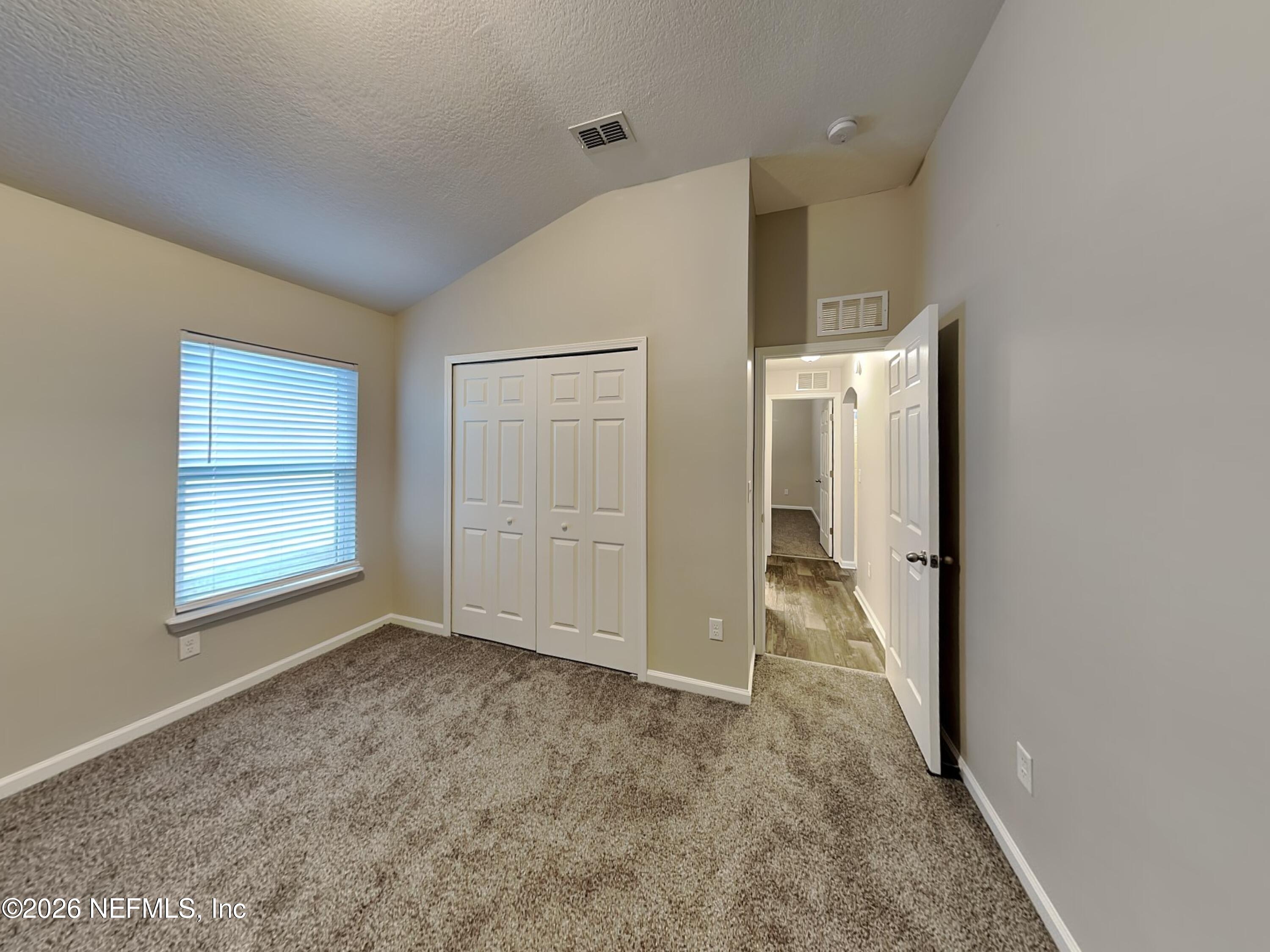 83245 Purple Martin Drive Yulee, FL 32097 - Photo 17 of 23 15_Bedroom-04_Image_t1BhRVgwAT