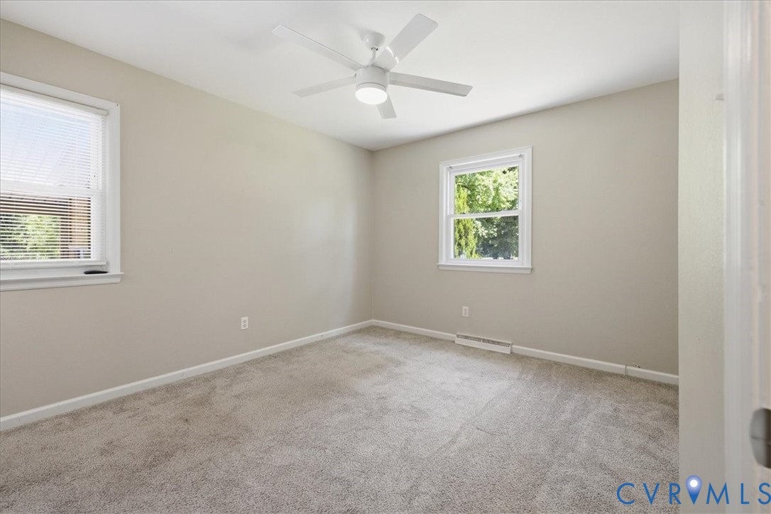 404 Bermuda Hundred Road Chester, VA 23836 - Photo 28 of 37 Carpeted room with neutral wall tones and a white