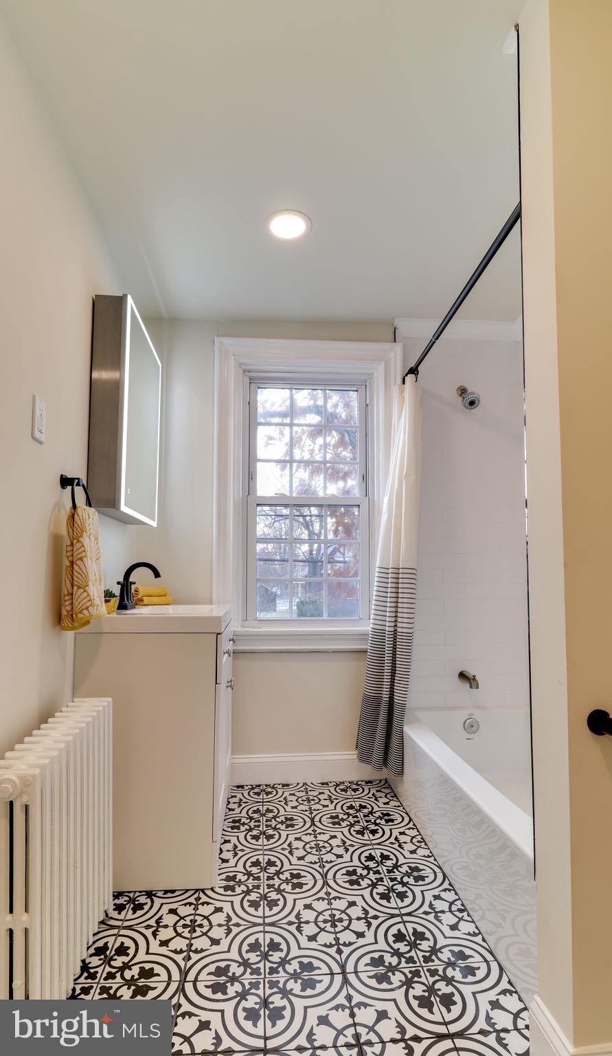 161 Warren Street Beverly, NJ 08010 - Photo 18 of 31 a room with a window and flowerpot