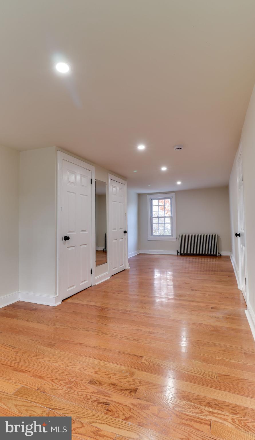 161 Warren Street Beverly, NJ 08010 - Photo 19 of 31 a view of empty room with wooden floor