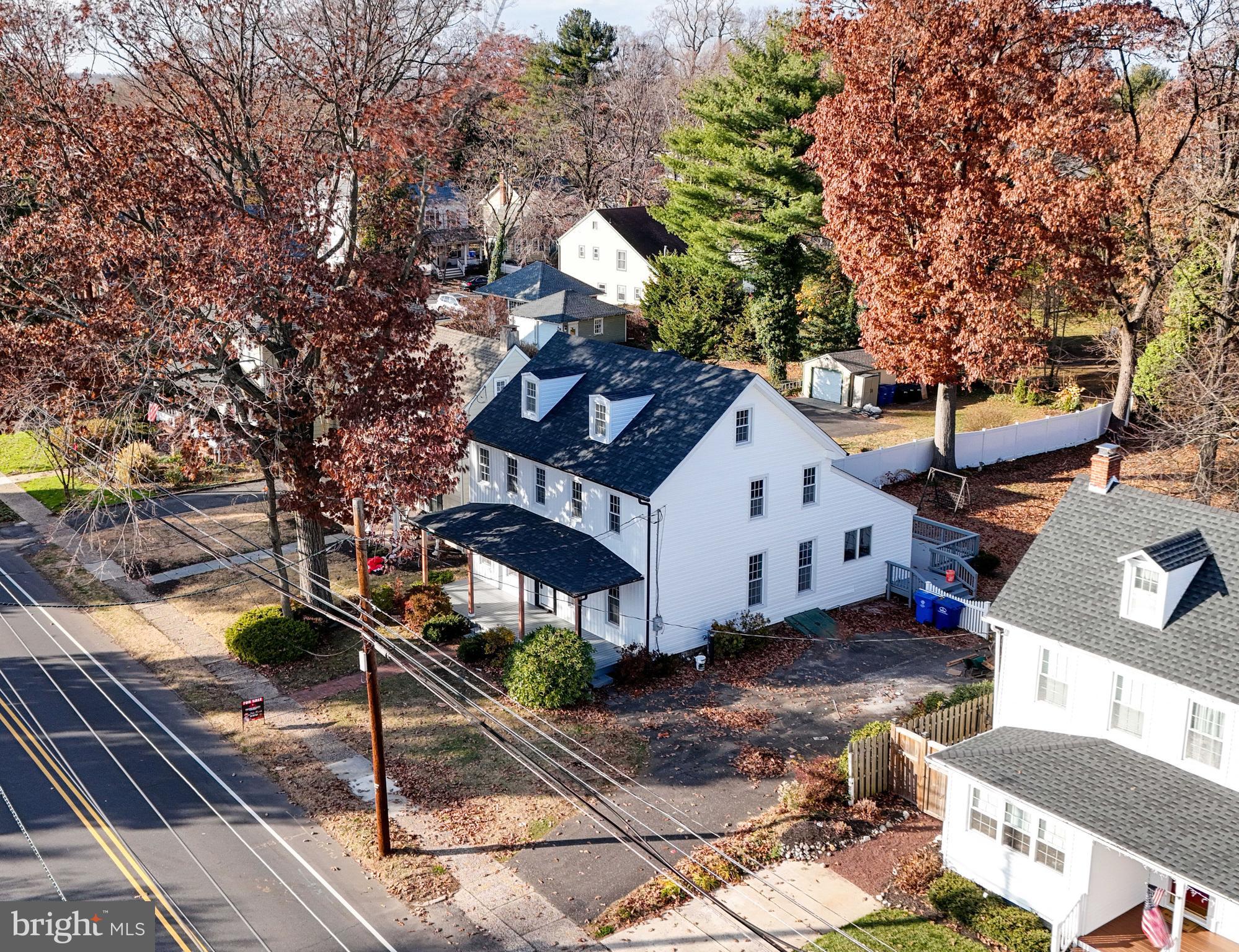 161 Warren Street Beverly, NJ 08010 - Photo 28 of 31 a view of a white house with a yard